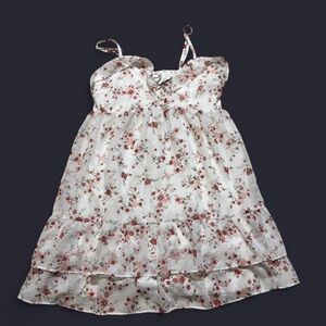White and pink floral babydoll dress with a ruffled hem size M